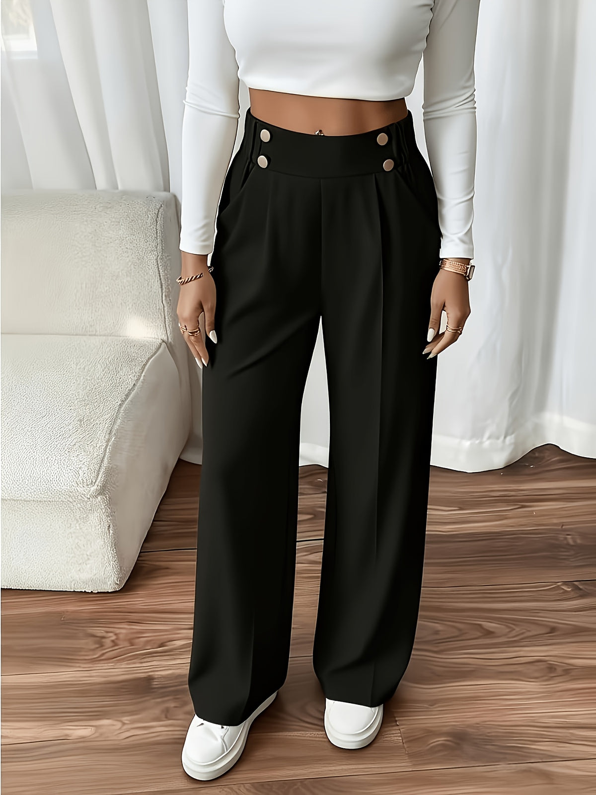 Hilde | Geplooide wide-leg broek met dubbele knoop